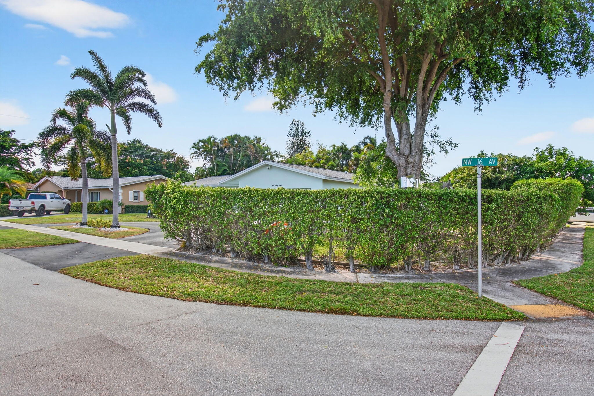 699 Northwest 16th Avenue Boca Raton, FL 33486 - Photo 46 of 46 a view of a yard with palm trees