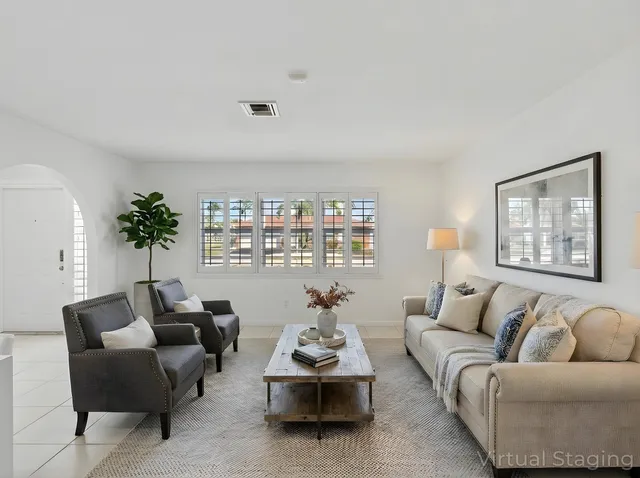 a large kitchen with cabinets and stainless steel appliances