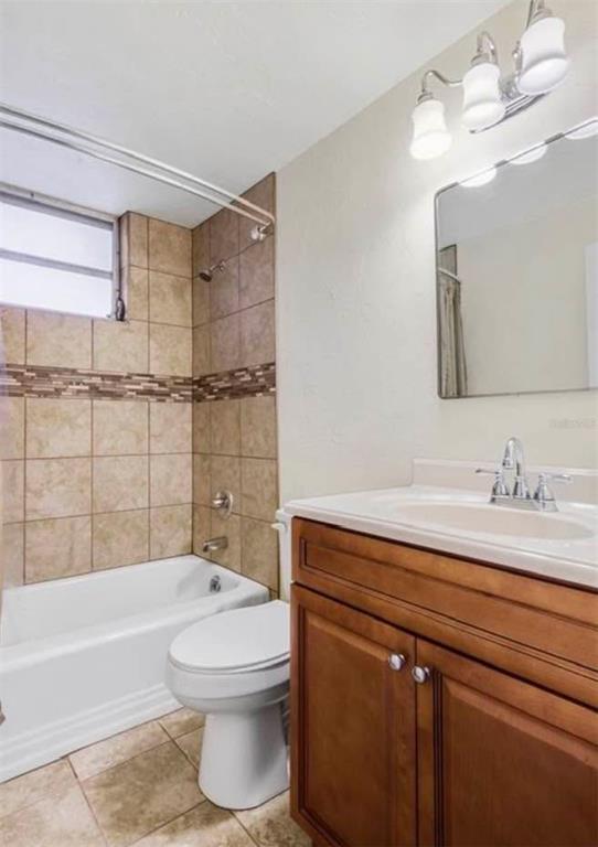 813 Northwest 22nd Street Gainesville, FL 32603 - Photo 23 of 32 a bathroom with a sink a toilet and shower