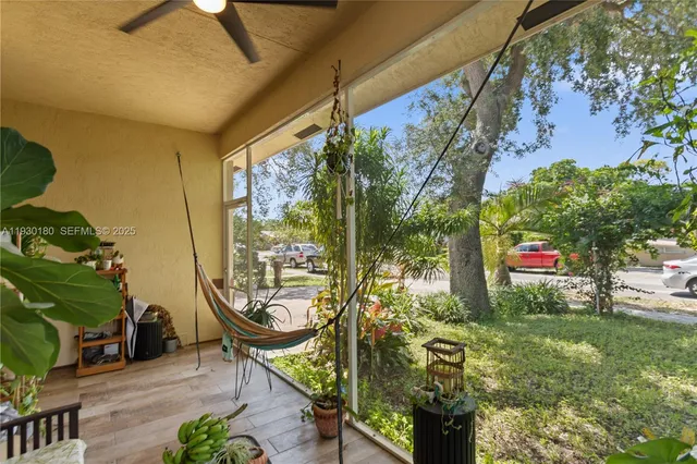 a view of a entryway with flower pots