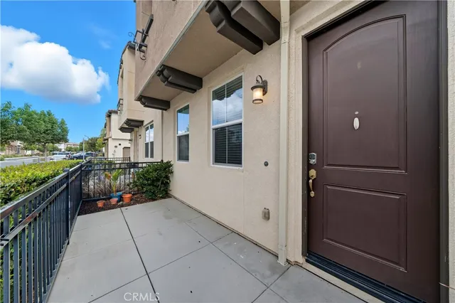 a path view of a house with wooden floor