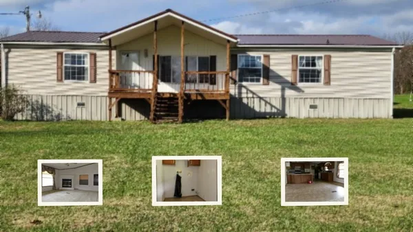 a front view of house with yard and outdoor seating