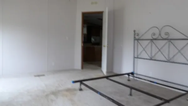 a view of a room with rack on the wall
