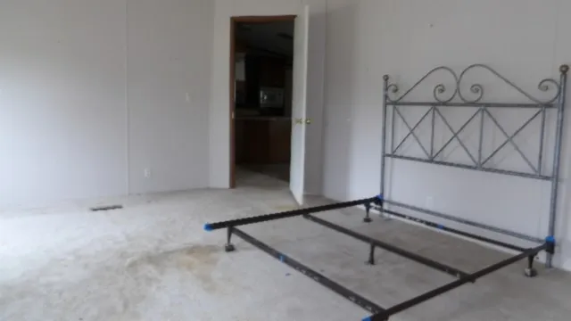 a room with a table and mirror