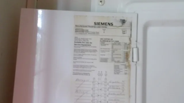 a view of a field with trees in the background