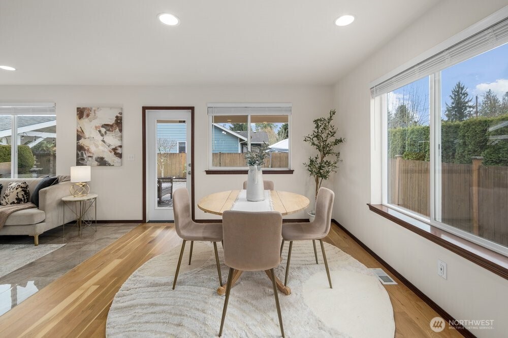 1152 Johnson Street Monroe, WA 98272 - Photo 23 of 38 a dining room with furniture and wooden floor