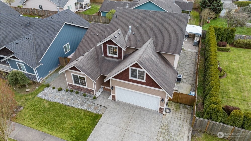 1152 Johnson Street Monroe, WA 98272 - Photo 36 of 38 an aerial view of a house with a yard
