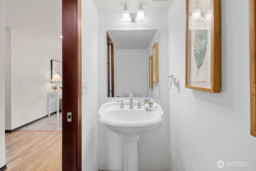 1152 Johnson Street Monroe, WA 98272 - Photo 6 of 38 a bathroom with a sink and a mirror