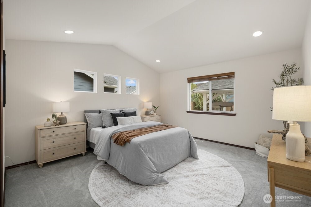 1152 Johnson Street Monroe, WA 98272 - Photo 7 of 38 a bedroom with bed and night stand