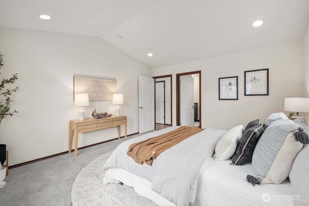 1152 Johnson Street Monroe, WA 98272 - Photo 9 of 38 a bedroom with a bed and a lamp