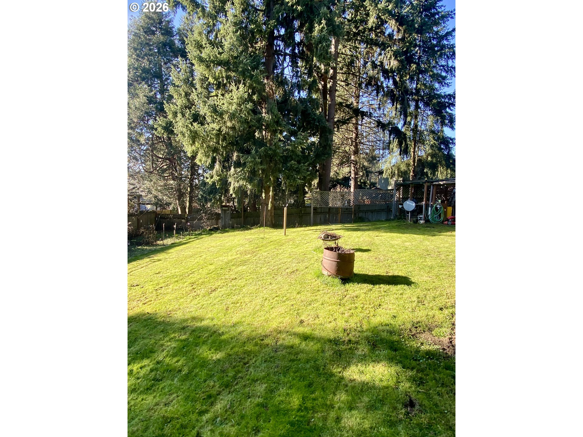 101 Northwest 107th Street Vancouver, WA 98685 - Photo 19 of 27 a swimming pool with some trees in the background