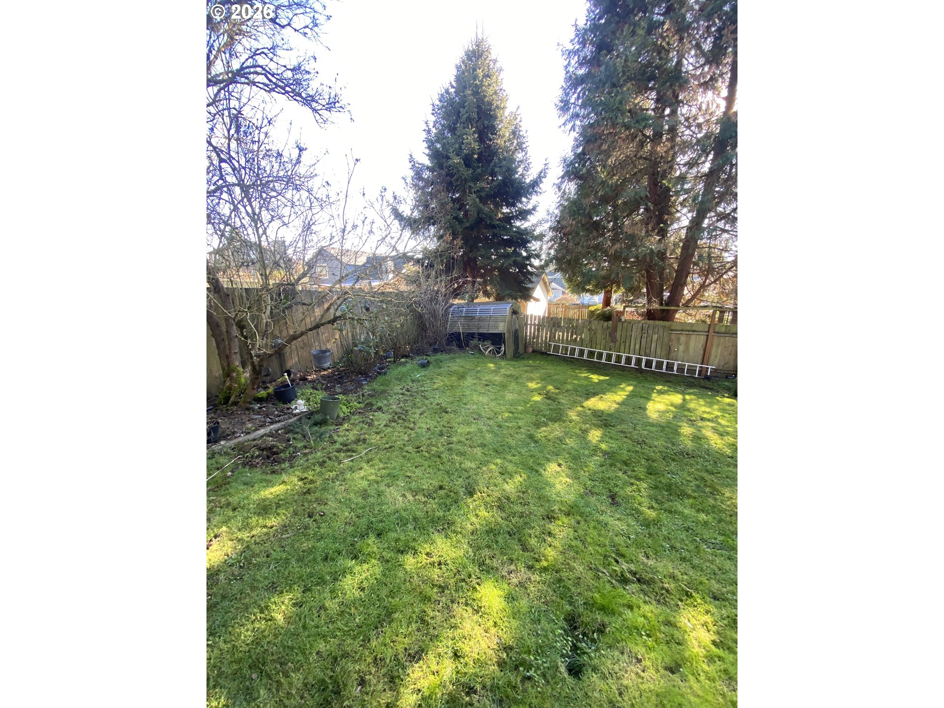 101 Northwest 107th Street Vancouver, WA 98685 - Photo 21 of 27 a backyard of a house with lots of green space