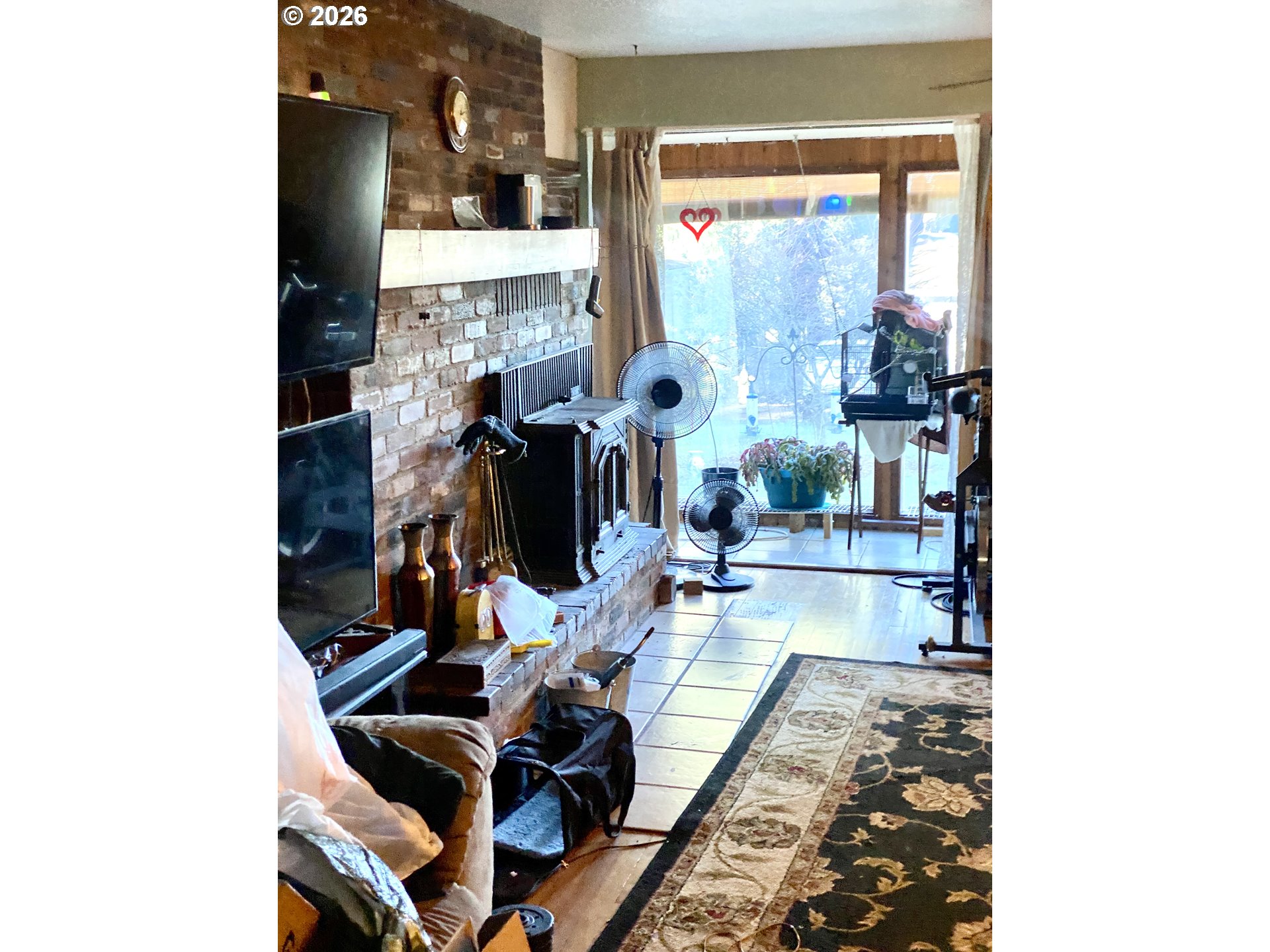 101 Northwest 107th Street Vancouver, WA 98685 - Photo 5 of 27 a living room with furniture and a fireplace