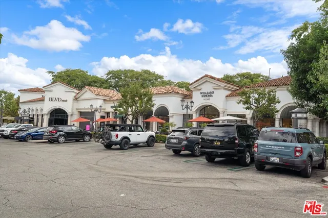 a view of a cars park in front of house