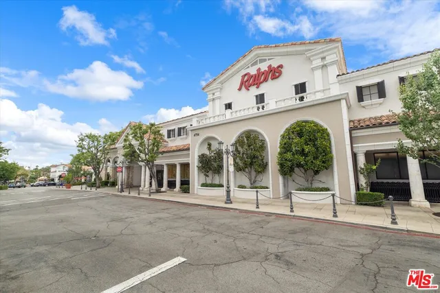 a front view of building with street