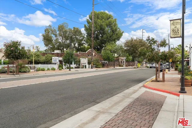 a view of a street with houses