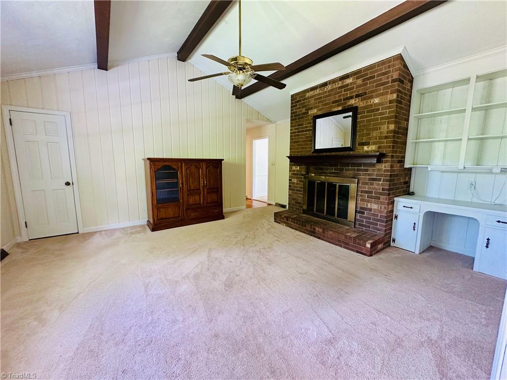 4261 Witherow Road Winston-Salem, NC 27106 - Photo 12 of 40 Den with fireplace