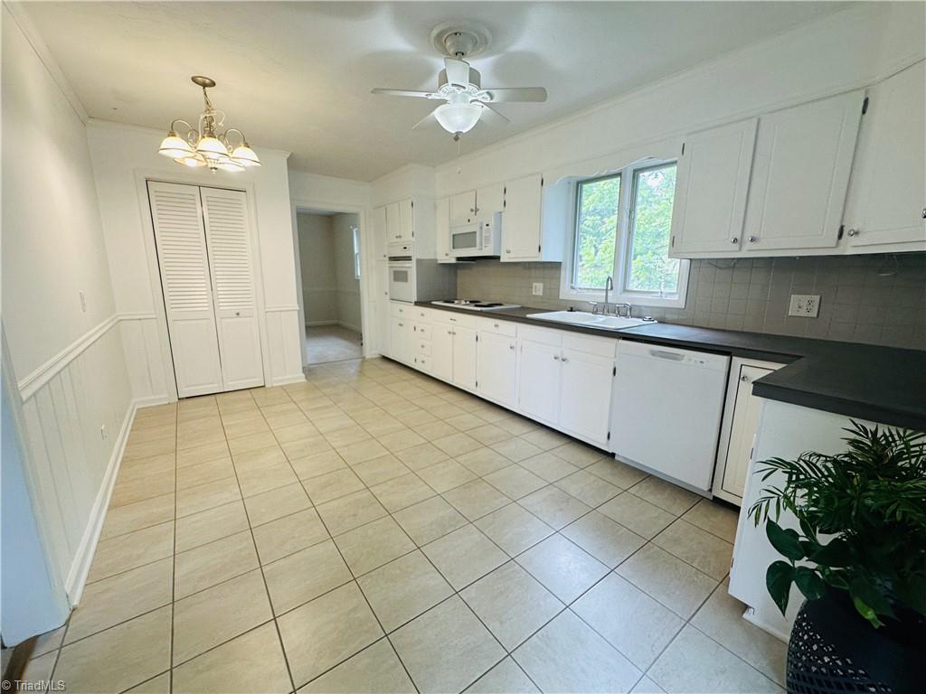 4261 Witherow Road Winston-Salem, NC 27106 - Photo 8 of 40 Kitchen leading to dining area