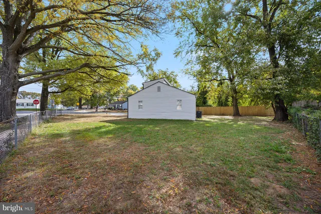 a view of backyard with green space