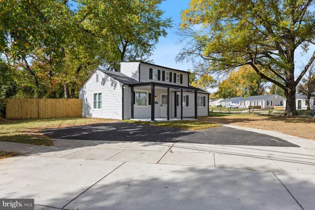 a view of street with large trees