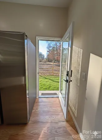 a view of empty room with front door