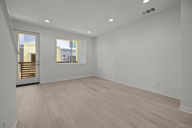 an empty room with windows