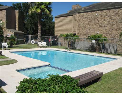 7122 Premont Drive, Unit C104 Corpus Christi, TX 78414 - Photo 9 of 9 a view of a backyard with sitting area