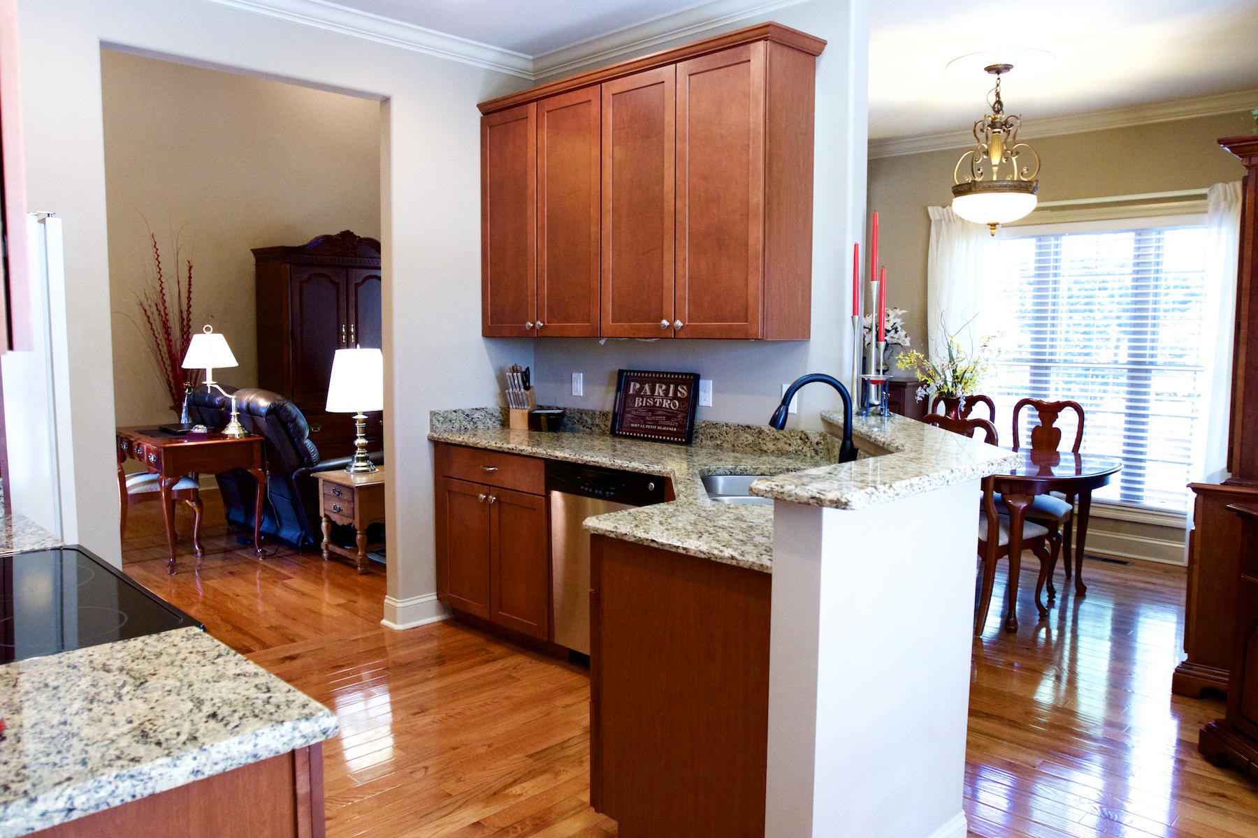 113 Crossroads Boulevard Oak Ridge, TN 37830 - Photo 11 of 24 a kitchen with granite countertop a sink a counter top space and cabinets