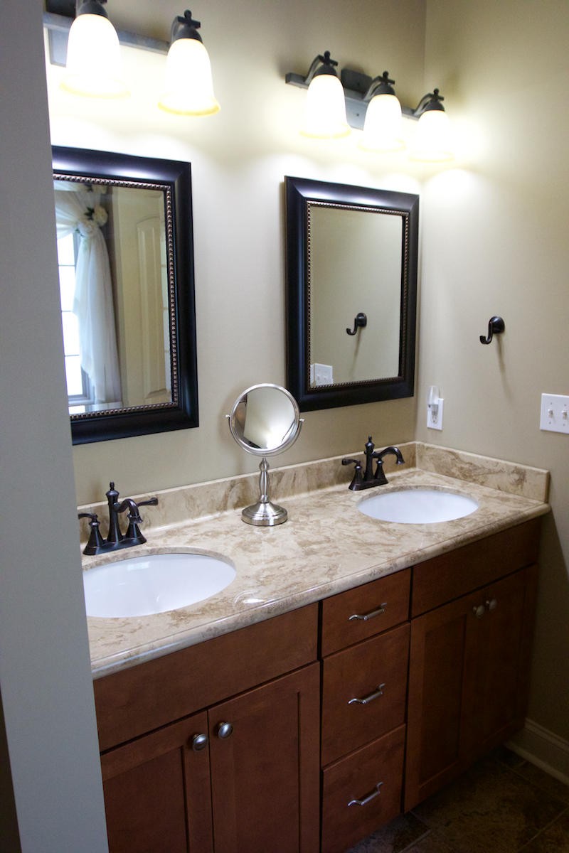 113 Crossroads Boulevard Oak Ridge, TN 37830 - Photo 18 of 24 a bathroom with a toilet sink and mirror