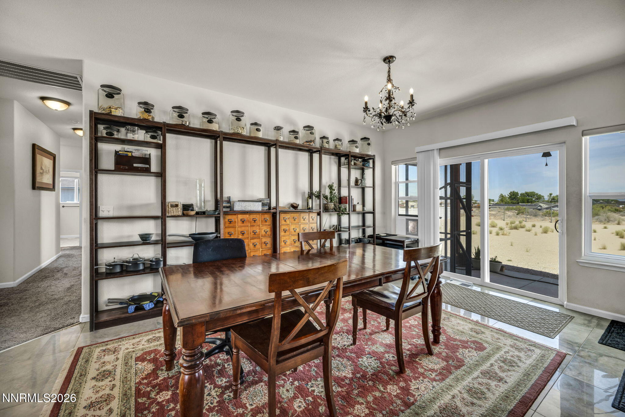 1286 Sky Ridge Drive Fallon, NV 89406 - Photo 21 of 49 a view of a dining room with furniture window and wooden floor