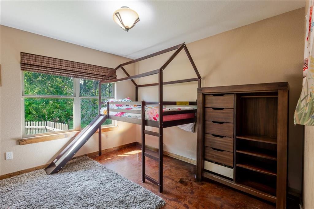 181 Savannah Drive Weatherford, TX 76087 - Photo 16 of 36 a bedroom with furniture and a window