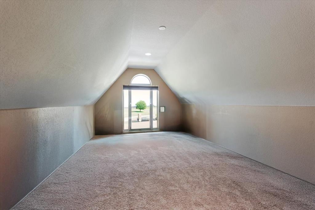 181 Savannah Drive Weatherford, TX 76087 - Photo 18 of 36 an empty room with windows