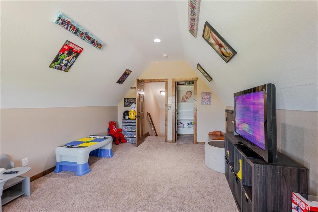 181 Savannah Drive Weatherford, TX 76087 - Photo 19 of 36 a view of a hallway with toys