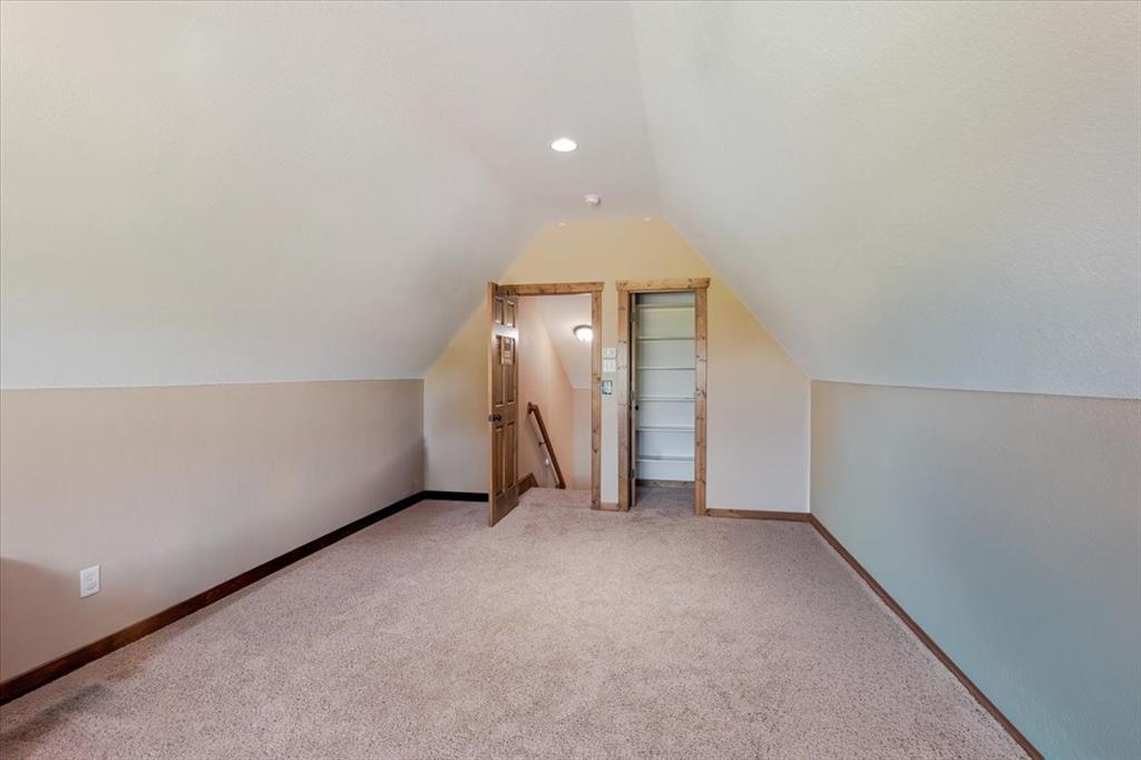 181 Savannah Drive Weatherford, TX 76087 - Photo 20 of 36 wooden floor in an empty room with a window