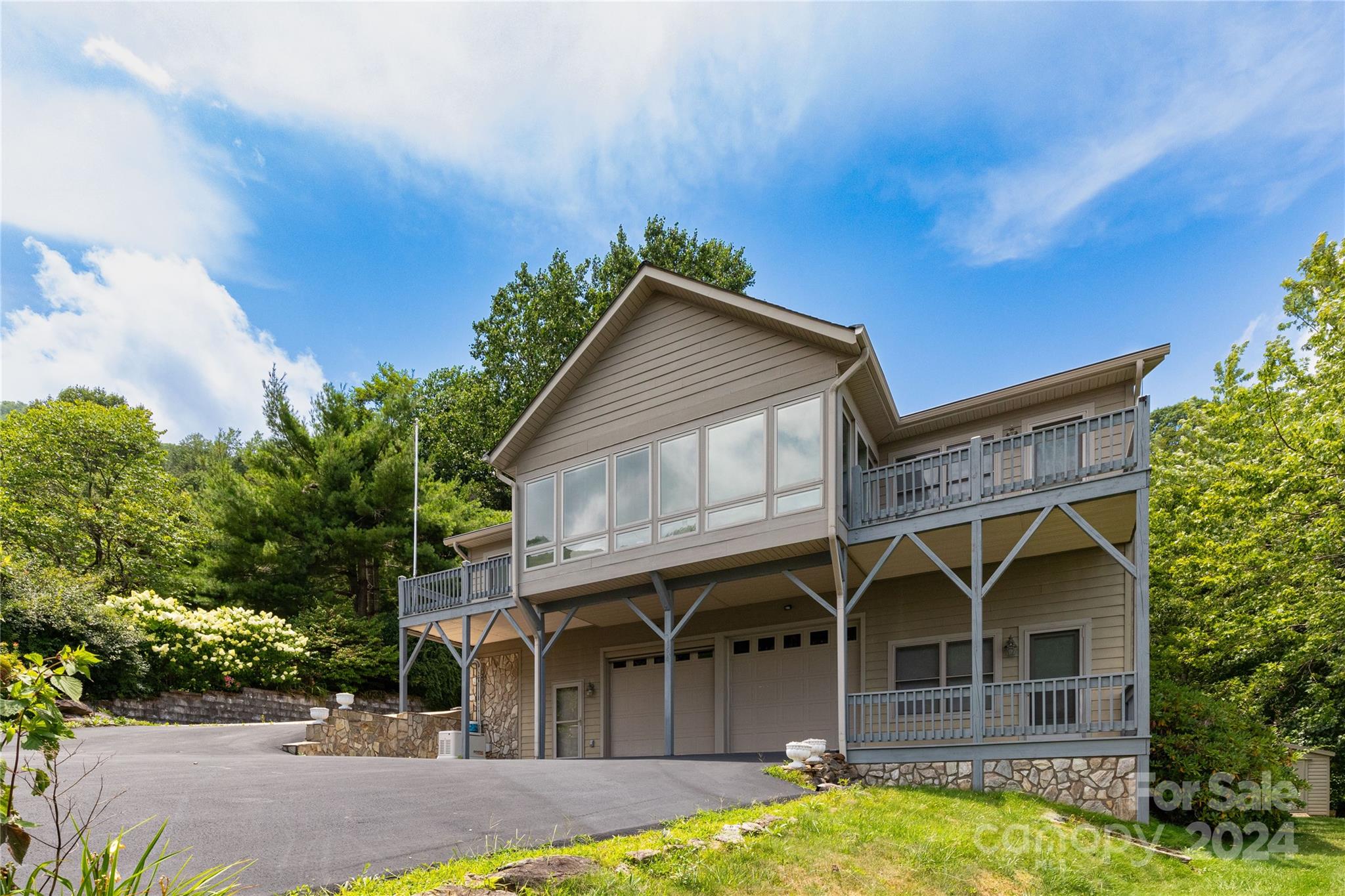 164 Atari Road Waynesville, NC 28786 - Photo 15 of 36 a view of a house with garden