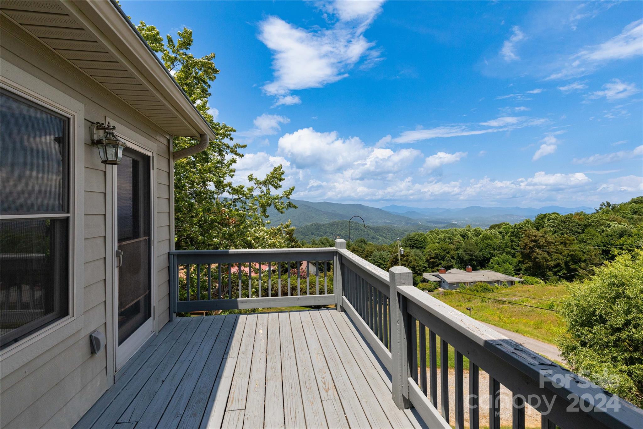 164 Atari Road Waynesville, NC 28786 - Photo 17 of 36 a view of city from a balcony