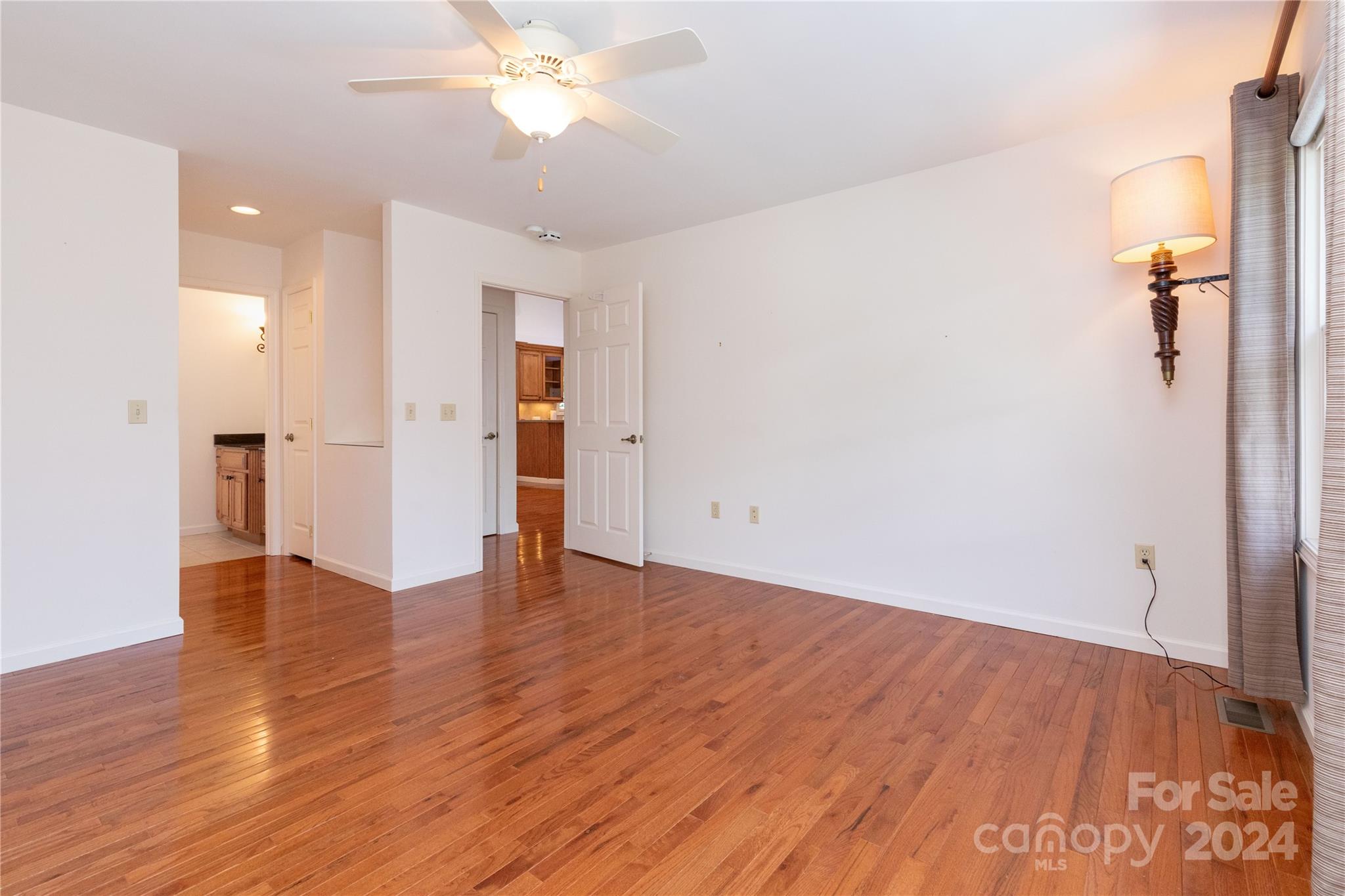 164 Atari Road Waynesville, NC 28786 - Photo 36 of 36 a view of an empty room with wooden floor