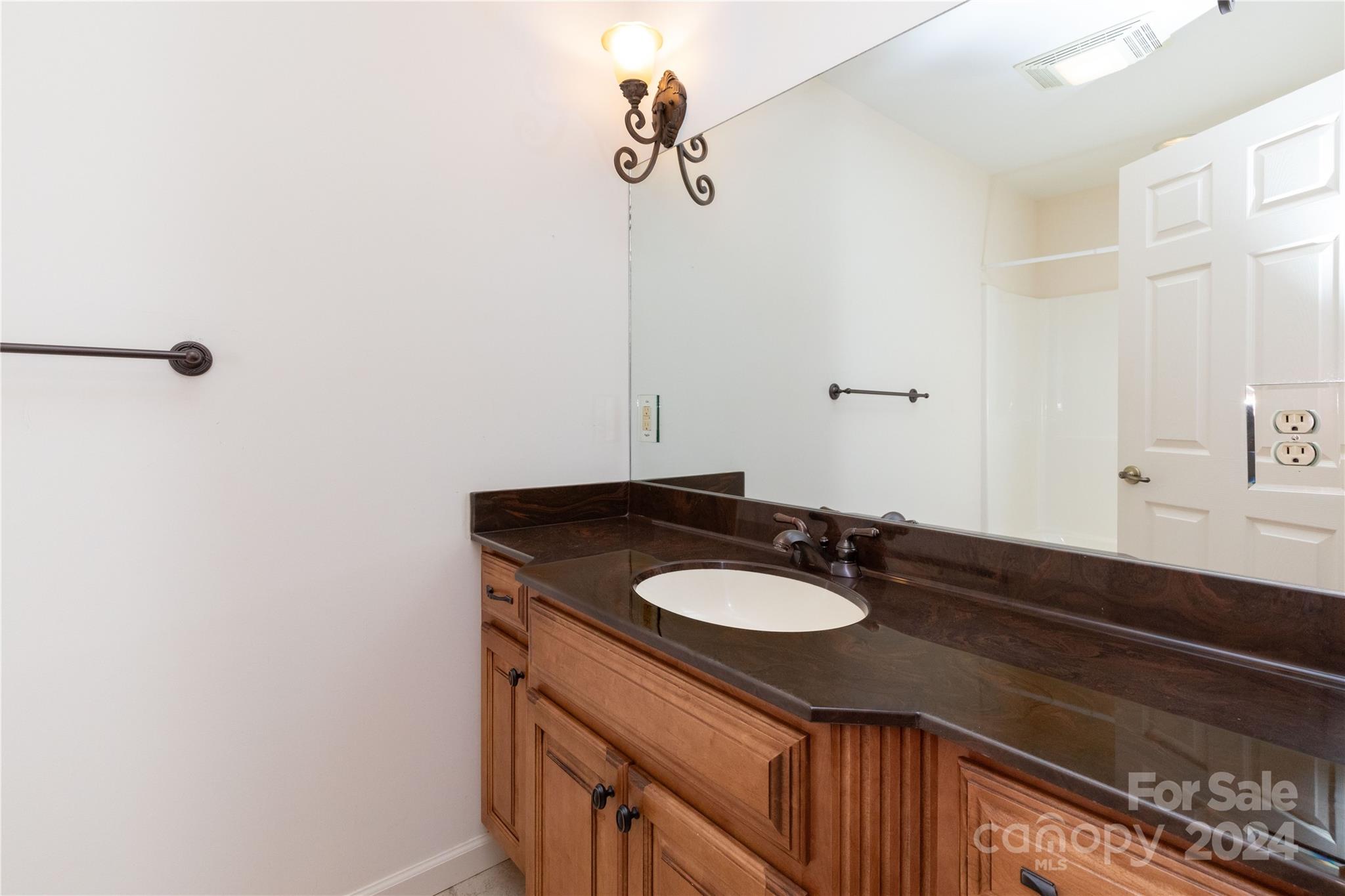 164 Atari Road Waynesville, NC 28786 - Photo 8 of 36 a bathroom with a sink and a mirror