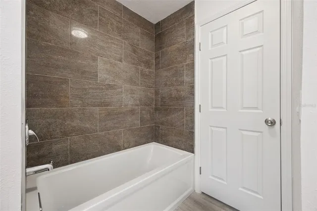 a bathroom with a bathtub