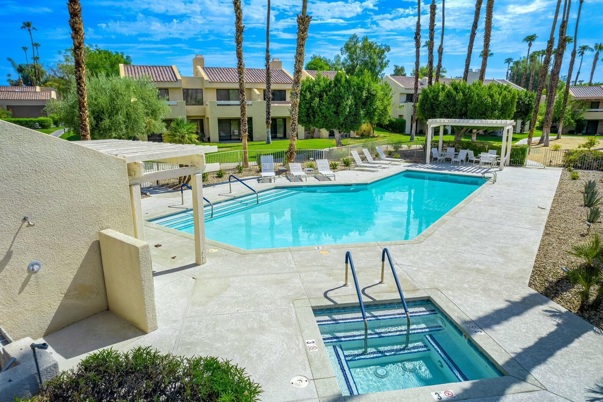 38 Mission Court Rancho Mirage, CA 92270 - Photo 12 of 61 swimming pool view with a seating space