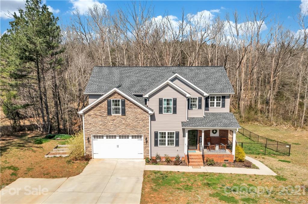 4081 Ruston Creek Road Catawba, SC 29704 - Photo 1 of 38 a front view of a house with garden