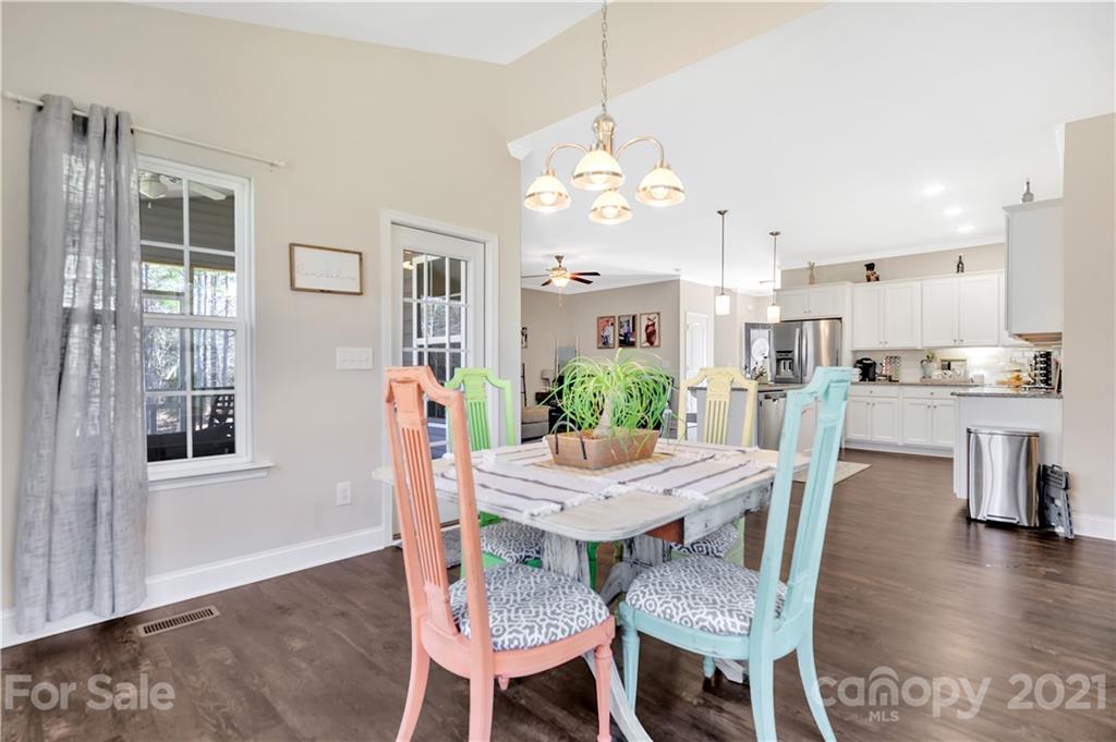 4081 Ruston Creek Road Catawba, SC 29704 - Photo 12 of 38 a view of a dining room with furniture and wooden floor