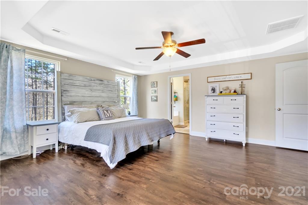 4081 Ruston Creek Road Catawba, SC 29704 - Photo 16 of 38 a spacious bedroom with a bed and a window