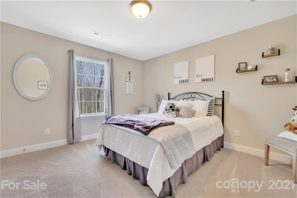 4081 Ruston Creek Road Catawba, SC 29704 - Photo 21 of 38 a bedroom with a bed and a window