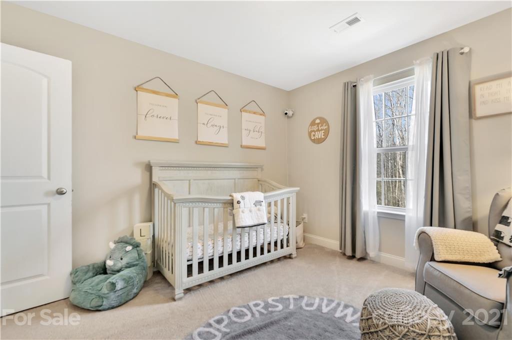4081 Ruston Creek Road Catawba, SC 29704 - Photo 27 of 38 a bedroom with furniture and a window