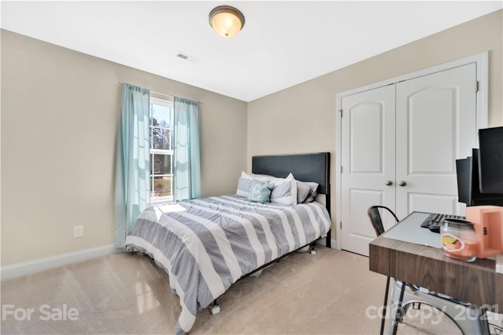 4081 Ruston Creek Road Catawba, SC 29704 - Photo 28 of 38 a bedroom with a bed and a window