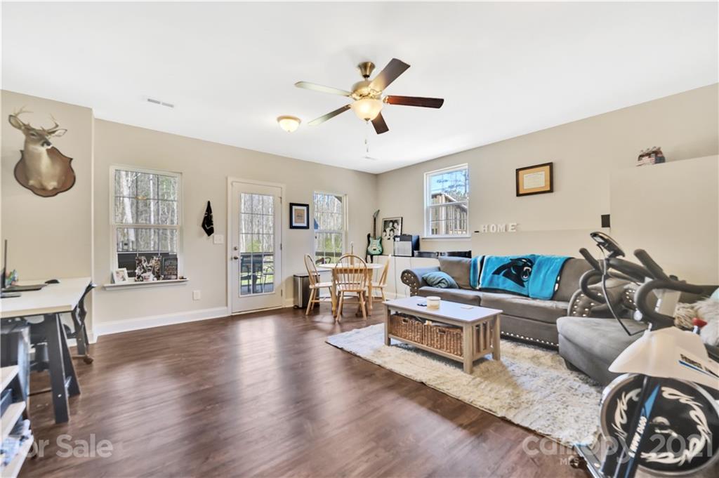 4081 Ruston Creek Road Catawba, SC 29704 - Photo 30 of 38 a living room with furniture and wooden floor