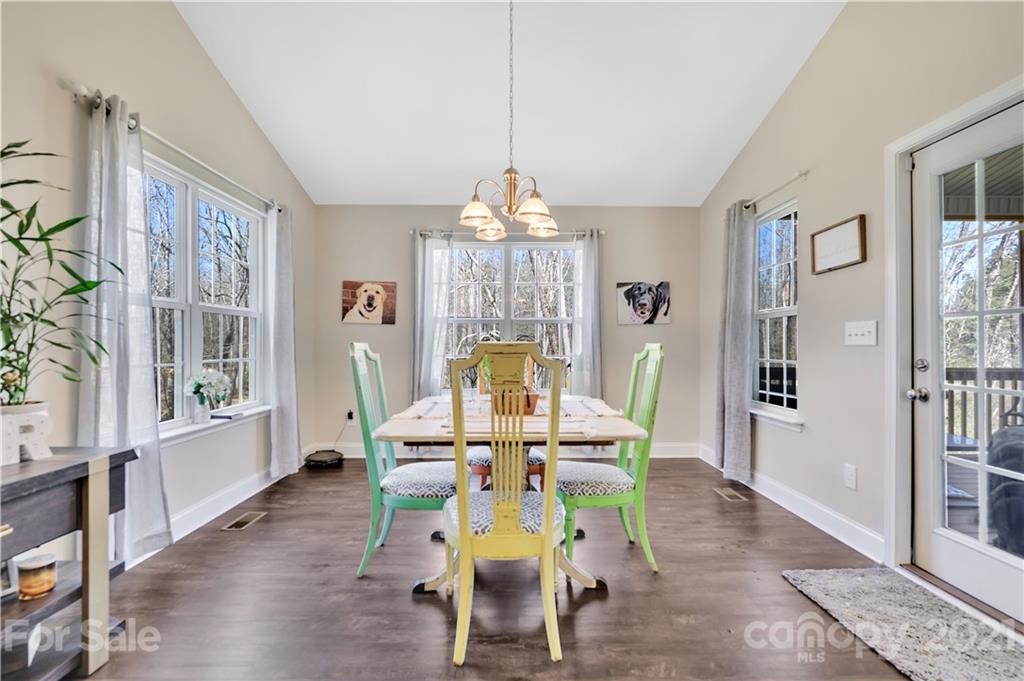 4081 Ruston Creek Road Catawba, SC 29704 - Photo 10 of 38 a view of a dining room with furniture window and wooden floor