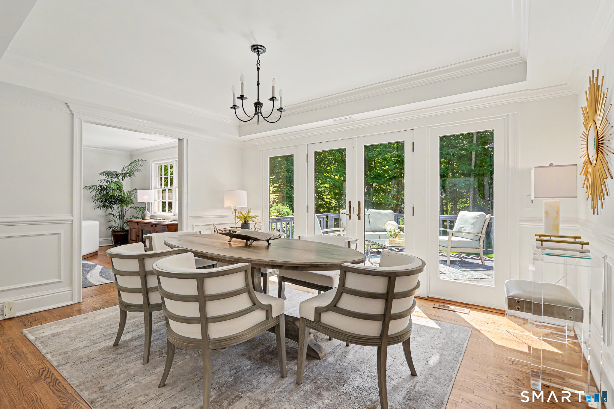 6 Adams Way Weston, CT 06883 - Photo 7 of 40 The dining room has French doors to one of two decks.