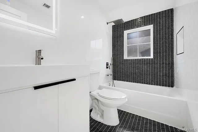 $2,360,000 | 38-32 215th Street | Bayside